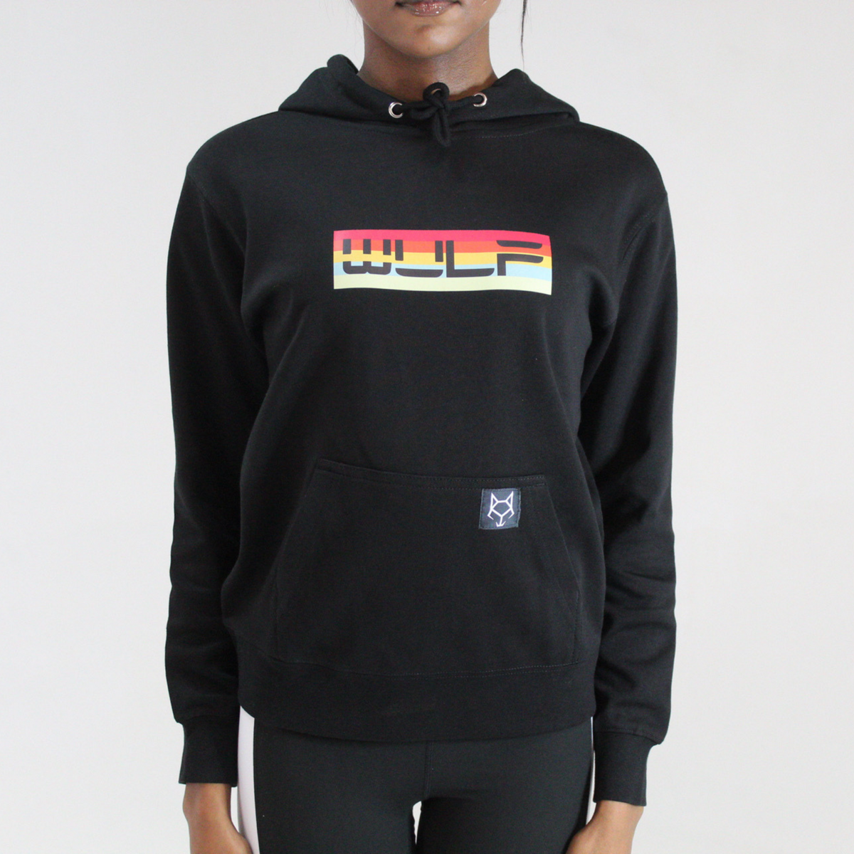 Our black cotton fleece women's hoodie is adorned with our iconic logo in rich, vintage shades. The drawstring hooded design offers versatility.
