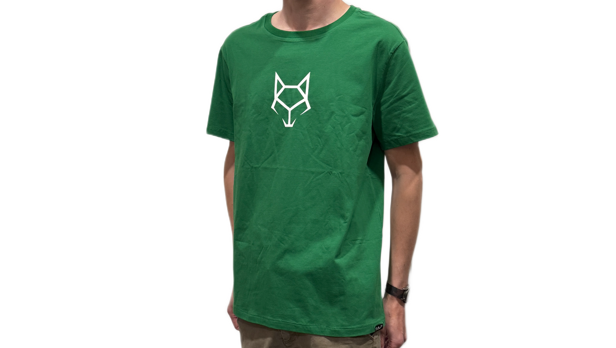 Green t-shirt with a white Wulf logo worn by a person on a white background